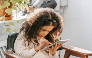 Girl Using A Tablet