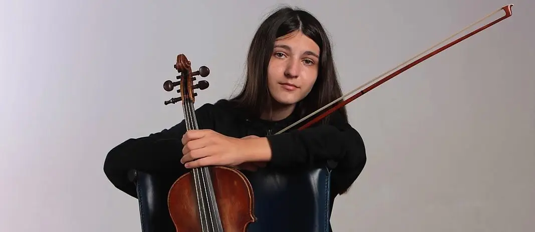 Mavridou Holding Her Violin